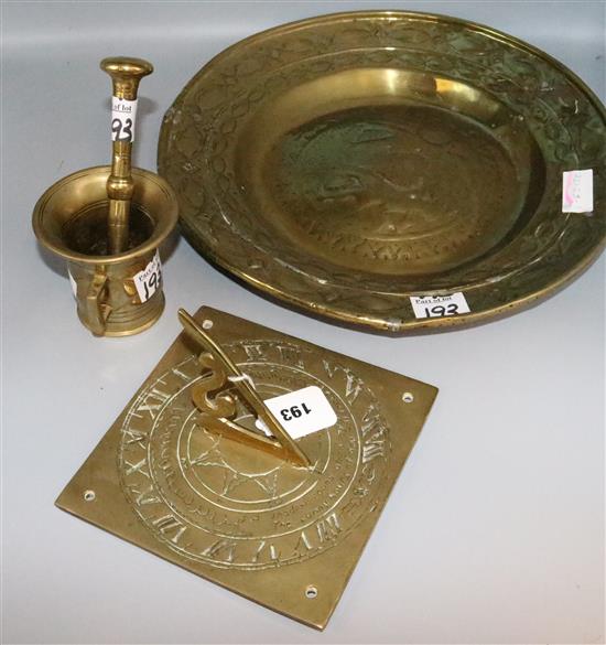 17th Century brass alms dish, brass pestle and mortar and a sun dial